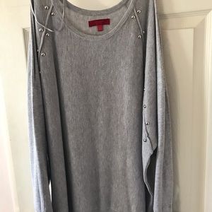 Light sweater with holes in shoulders